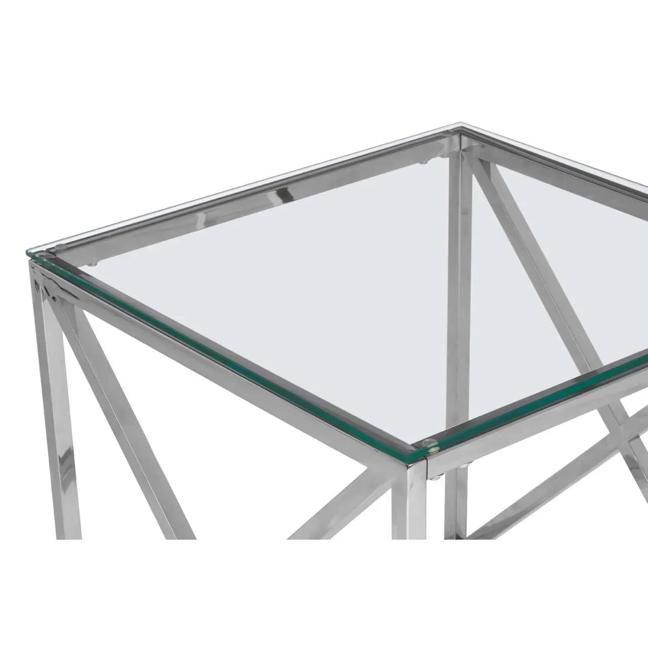 Glass top coffee table with chrome metal frame and geometric corner detail