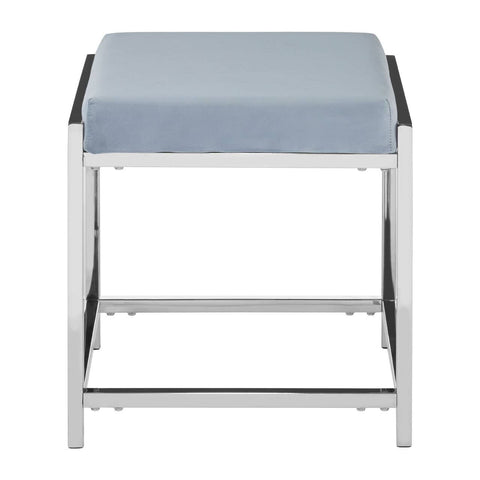 A powder blue velvet stool with a cushioned top and a sleek silver metal frame, featuring a minimalist design with clean lines and a sturdy base. The stool has a square shape and is positioned with its top facing upward, showcasing the soft texture of the velvet fabric