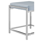 Powder blue velvet stool with a sleek silver metal frame, featuring a cushioned top and a minimalist design. The stool has a sturdy base with crossbars for added support