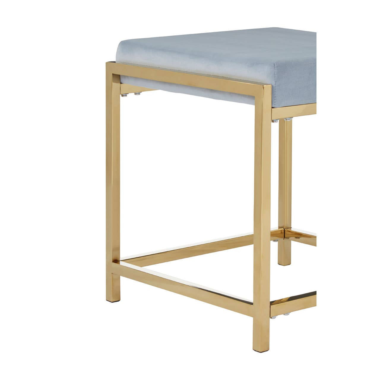 Powder blue velvet stool with a gold metal frame, featuring a square top and a minimalist design. The legs are straight and provide a sturdy base, highlighting a modern aesthetic
