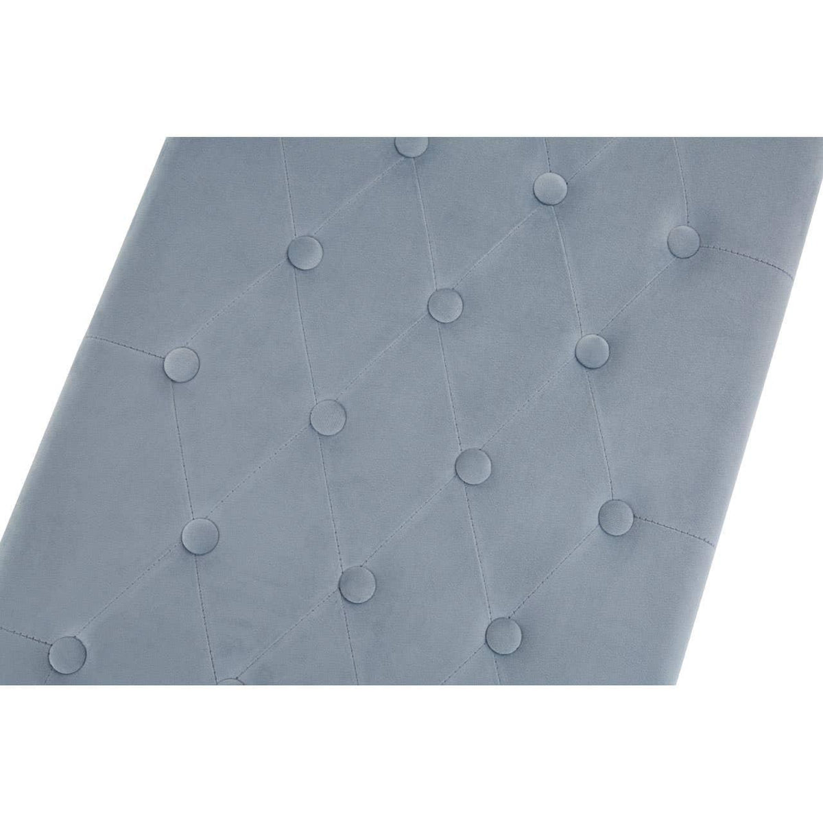 Light grey velvet upholstered headboard with diamond button tufting detail