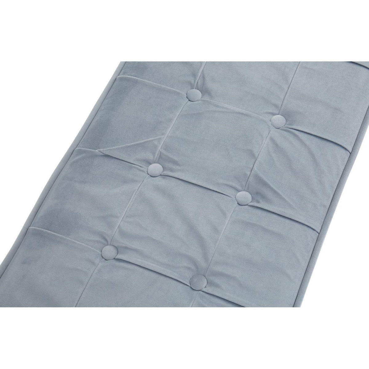Closeup of light grey tufted bench cushion with square stitching detail