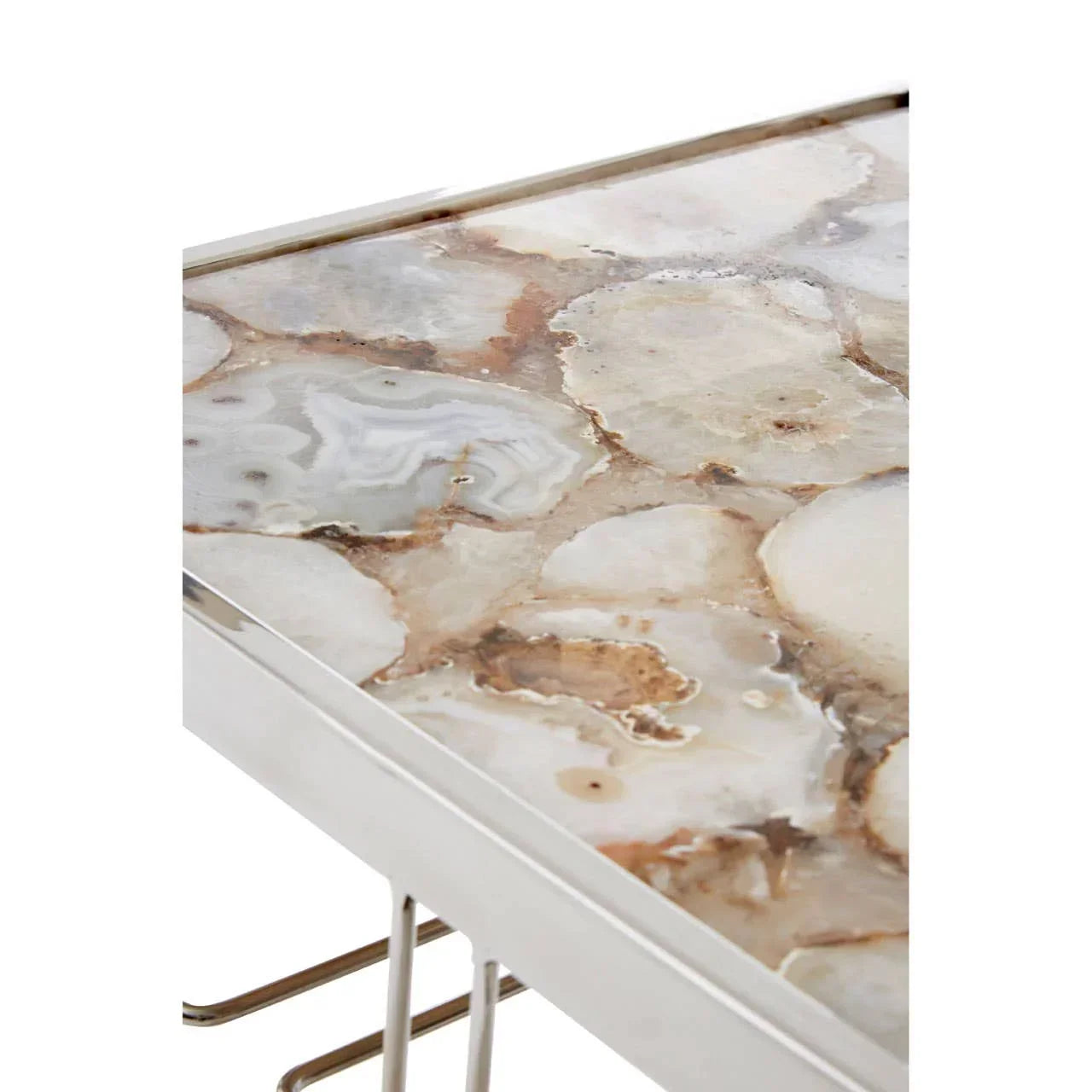 Agate top coffee table with polished metal legs, closeup showing stone surface detail