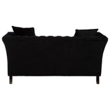 Black two-seat sofa with a sleek design, featuring a curved backrest and two matching cushions. The legs are wooden and slightly tapered, providing a modern touch. The fabric has a soft texture, enhancing its contemporary appeal