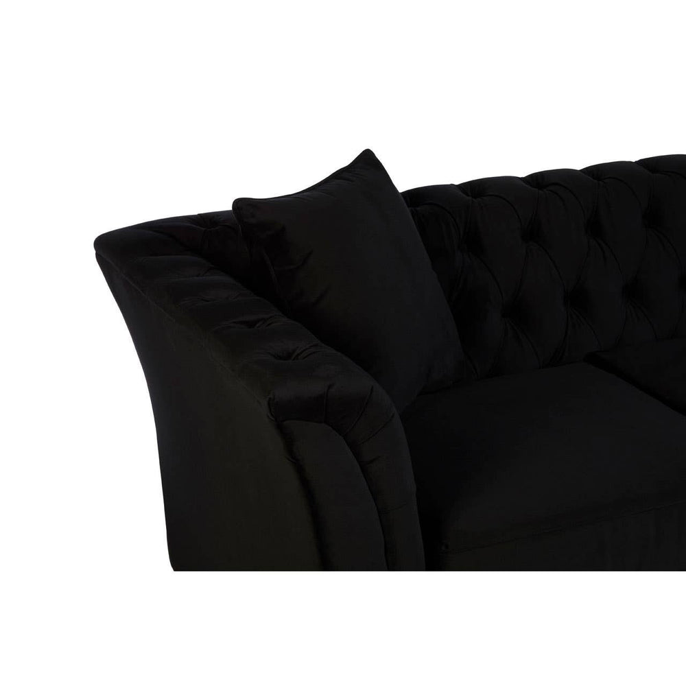 Black tufted fabric sofa with two seats, featuring a sleek design and a plush cushion. One side shows a decorative pillow resting against the armrest, highlighting the elegant stitching and smooth upholstery