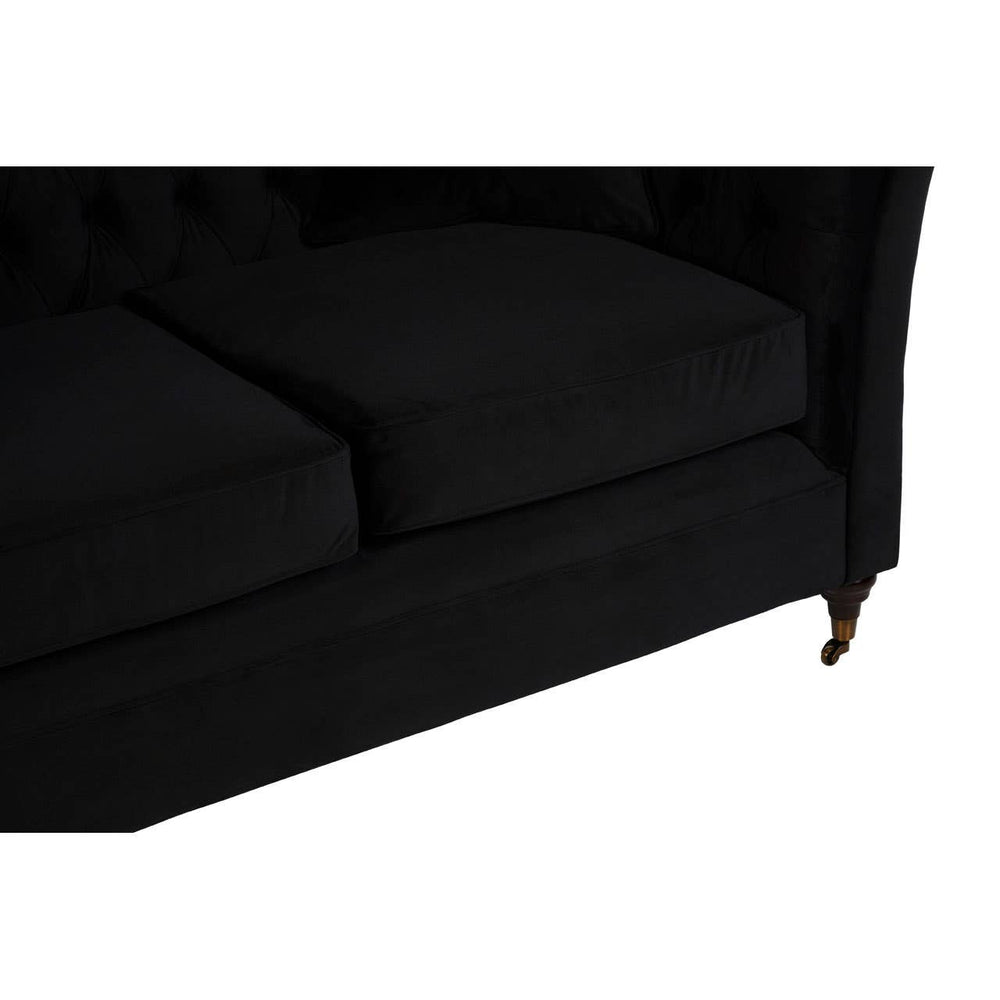 Black two-seat sofa with plush cushions and elegant gold legs, showcasing a sleek and modern design
