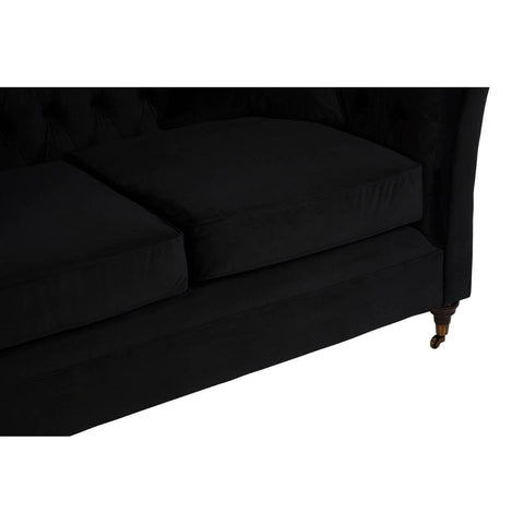 Black two-seat sofa with plush cushions and elegant gold legs, showcasing a sleek and modern design