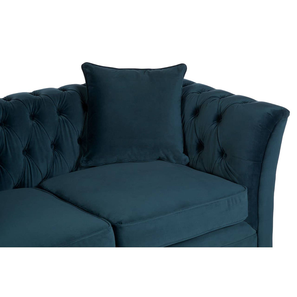 Midnight blue velvet two-seat sofa featuring a tufted backrest and a matching cushion, showcasing a sleek and modern design with curved arms