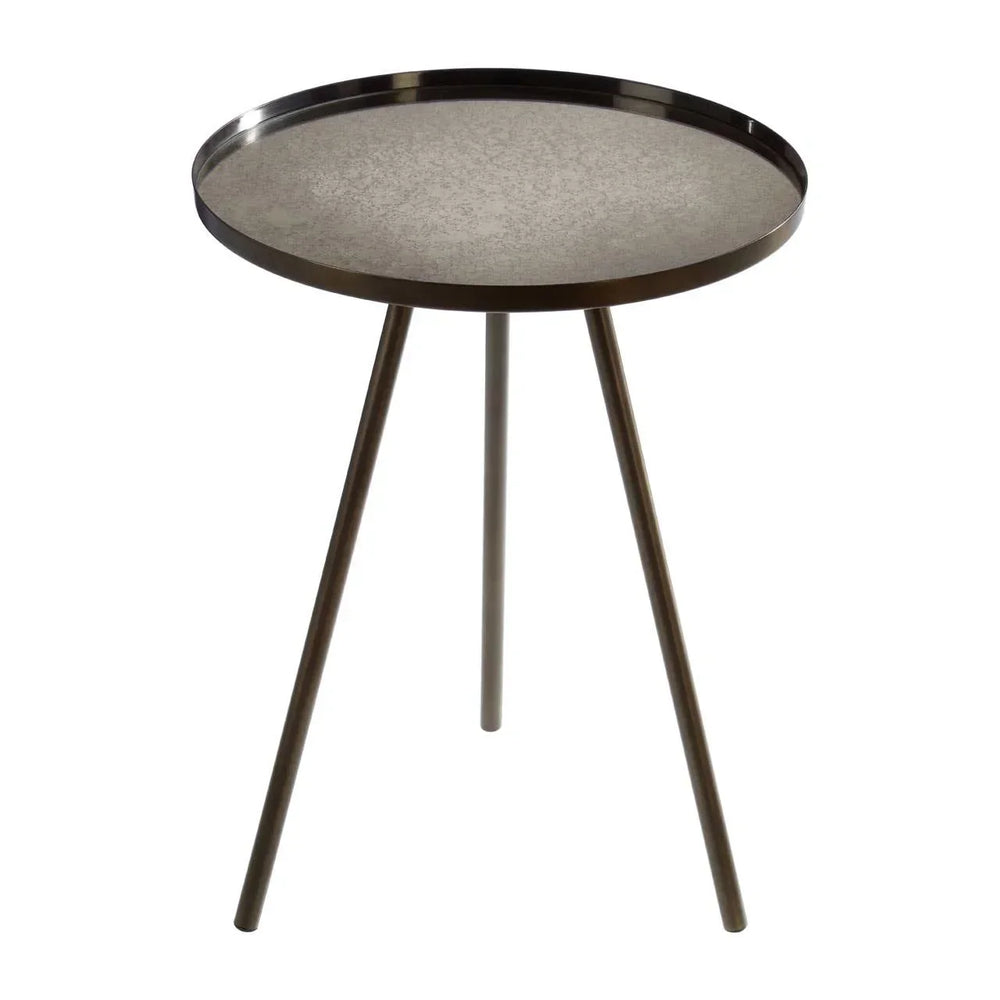 Round metal side table with a mirrored top and three angled legs
