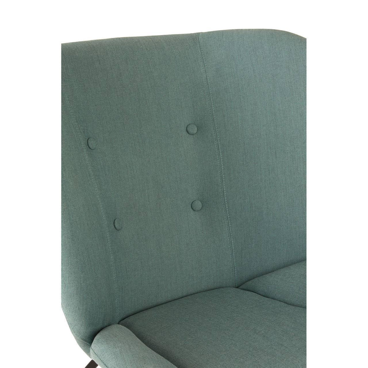 Close-up of green fabric armchair with button-tufted backrest and cushioned seat