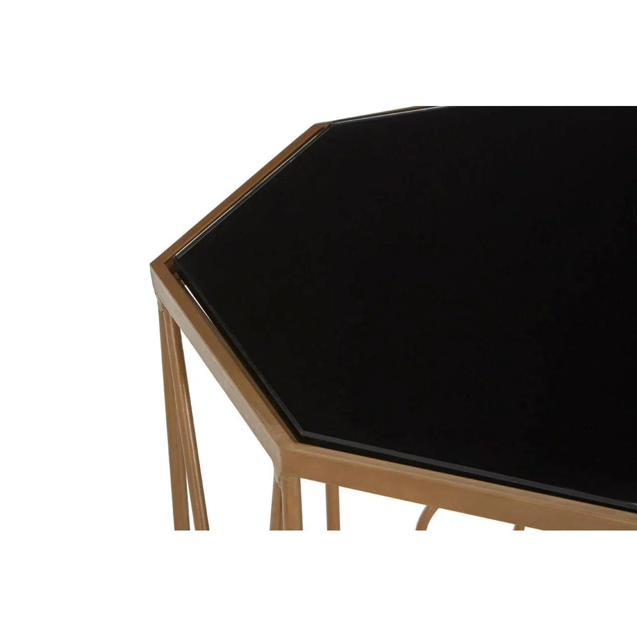Hexagonal black glass top side table with gold metal frame, close up corner view
