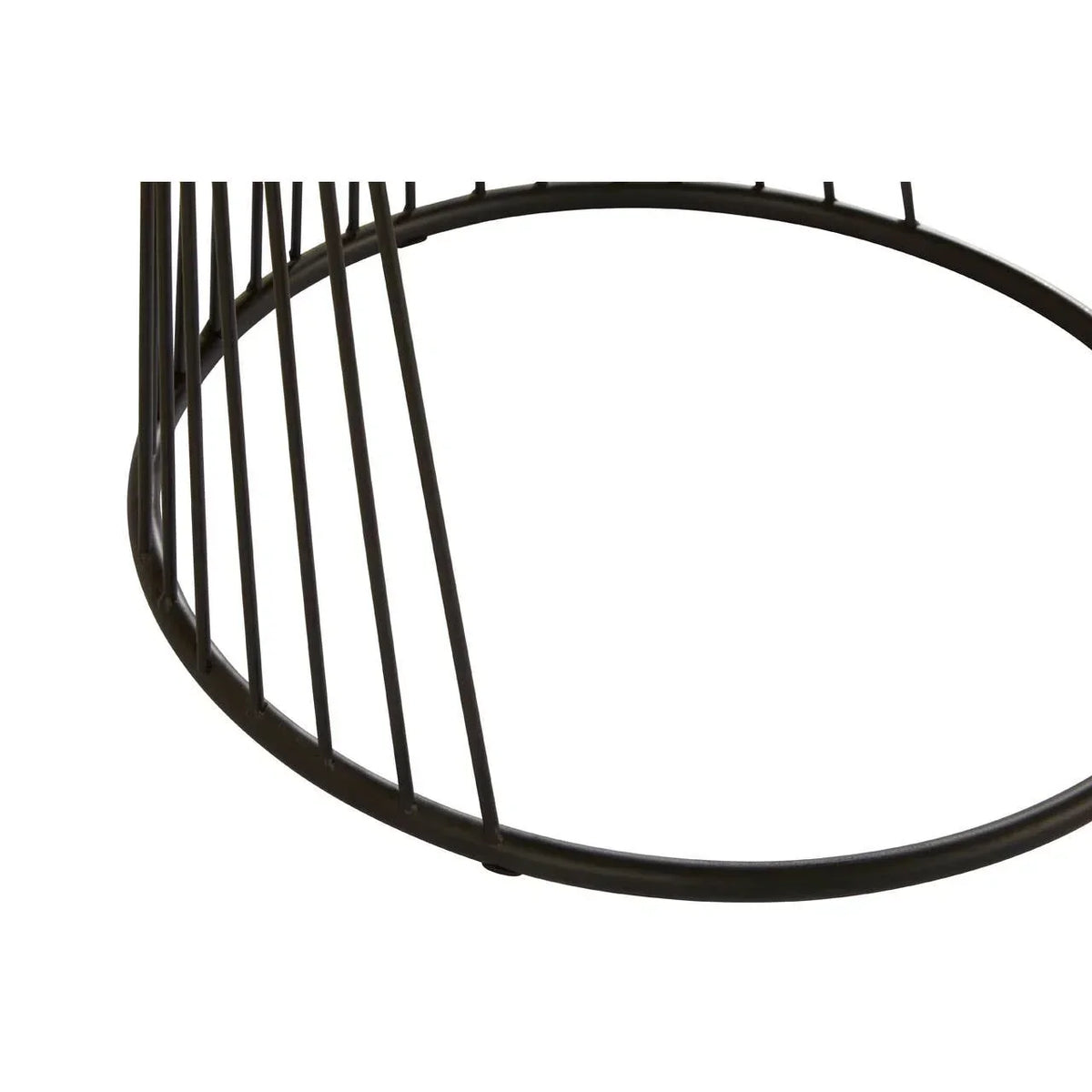 Close-up of round metal coffee table black wireframe base