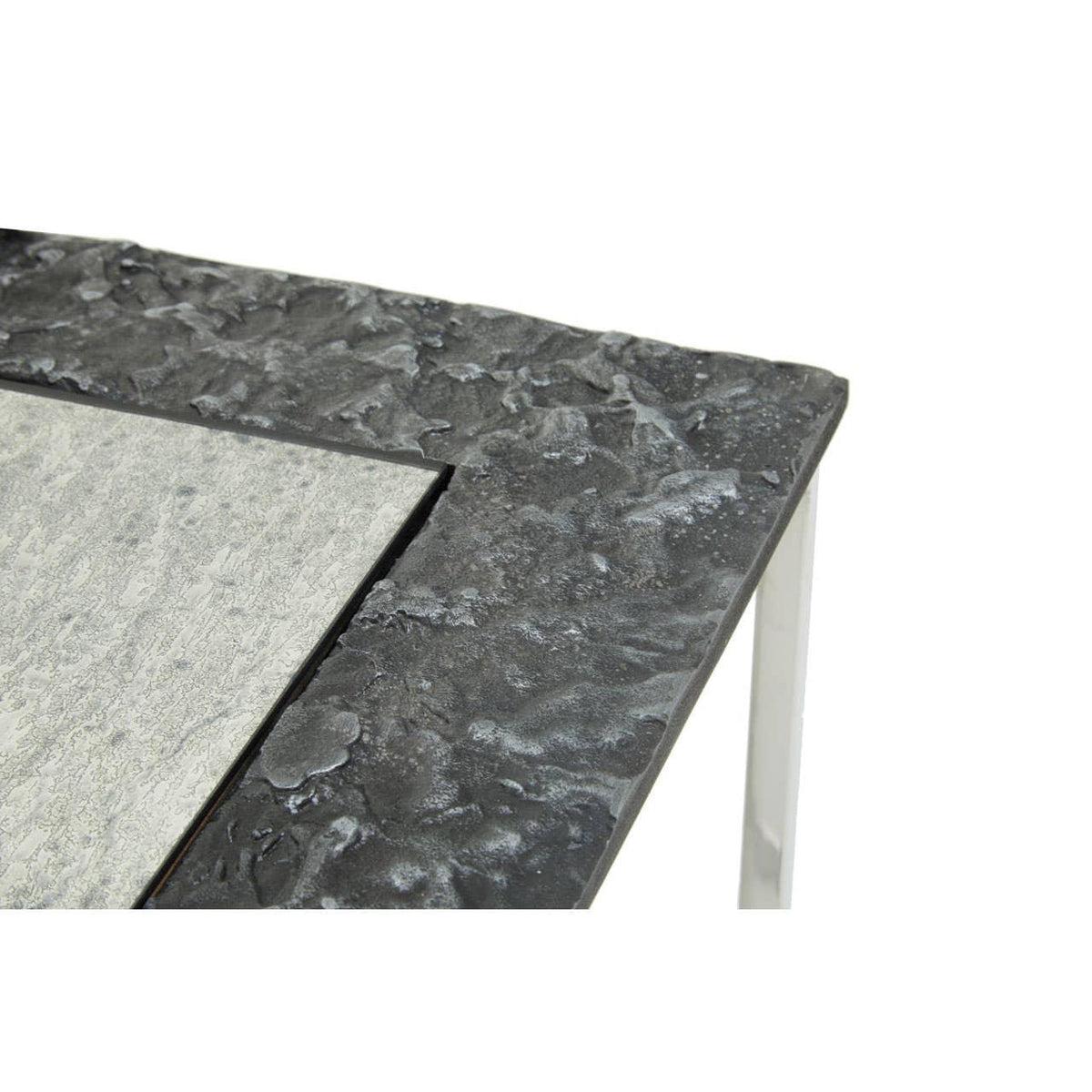 Corner detail of stone effect coffee table with textured black and grey tabletop