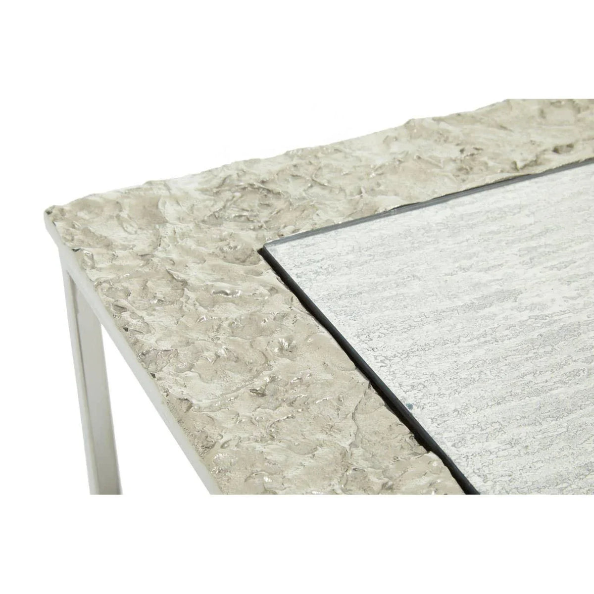 Modern stone effect dining table corner with textured surface and light grey tabletop