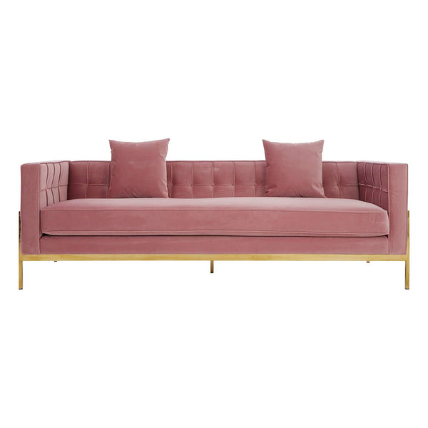 Three-seat pink sofa with a tufted backrest, two matching cushions, and sleek gold legs. The fabric has a soft texture, and the overall design is modern and elegant