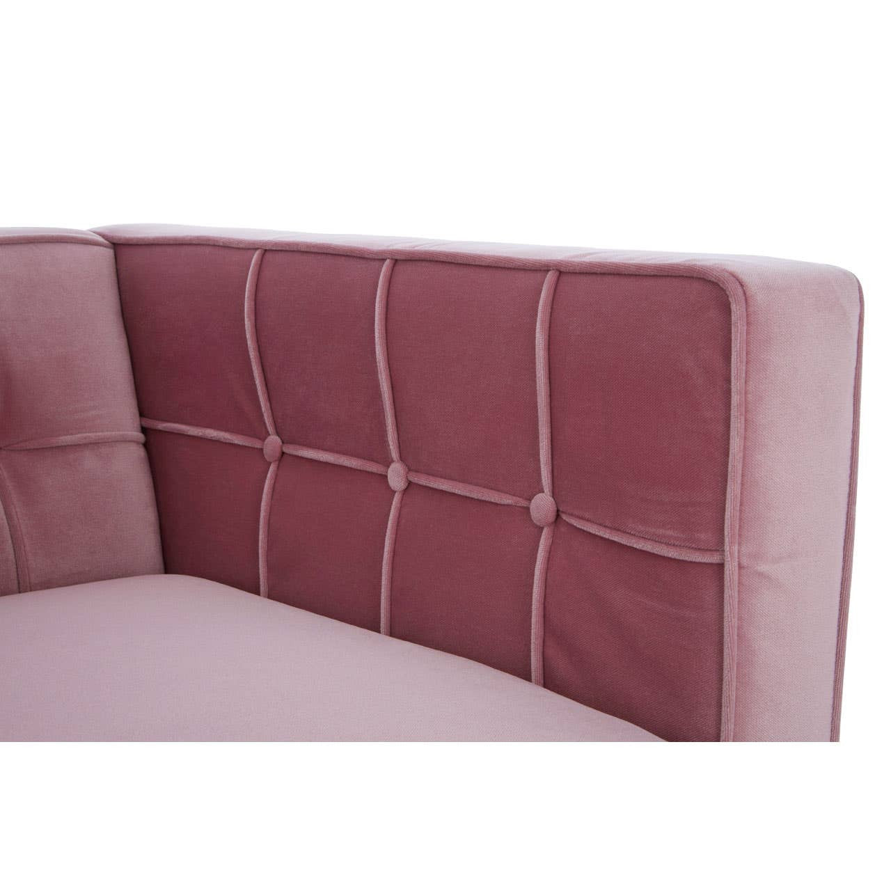 The corner of a pink sofa featuring a tufted backrest with a grid pattern, showcasing soft fabric upholstery. The design is modern and inviting, suitable for a cozy living space