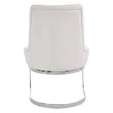 Rear view of white upholstered dining chair with chrome metal base