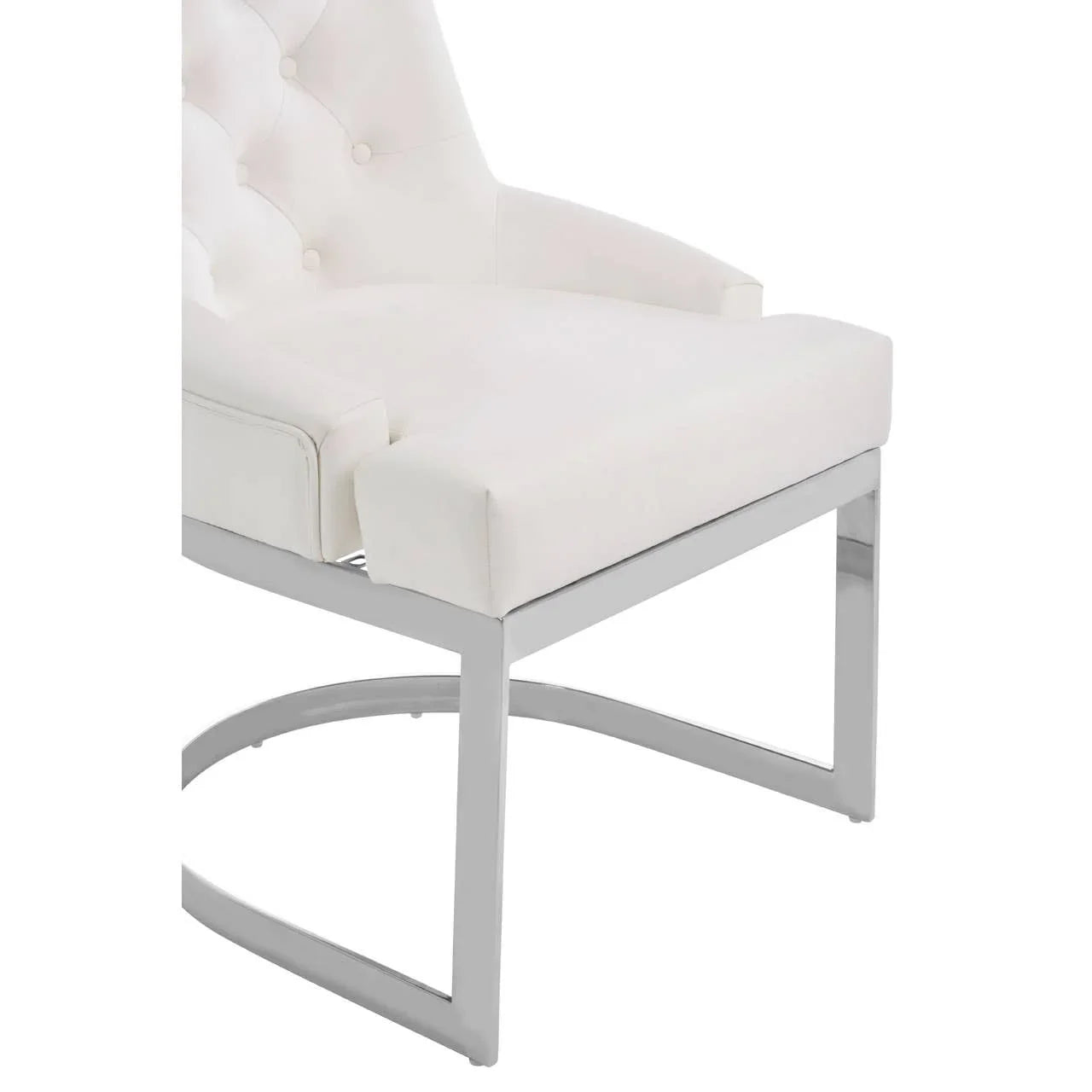 White upholstered dining chair with chrome metal legs and tufted backrest, angled side view