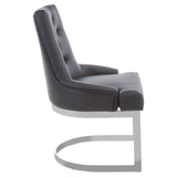 Side view of grey leather dining chair with chrome cantilever base and padded backrest