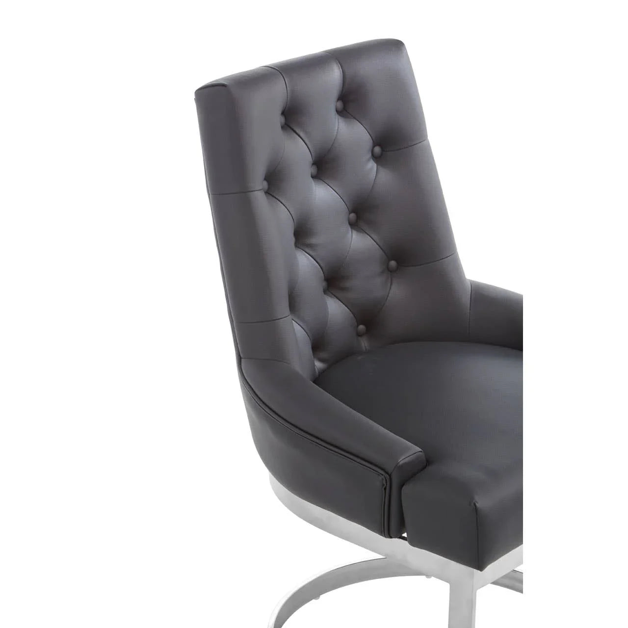 Black tufted leather dining chair with chrome base, angled side view