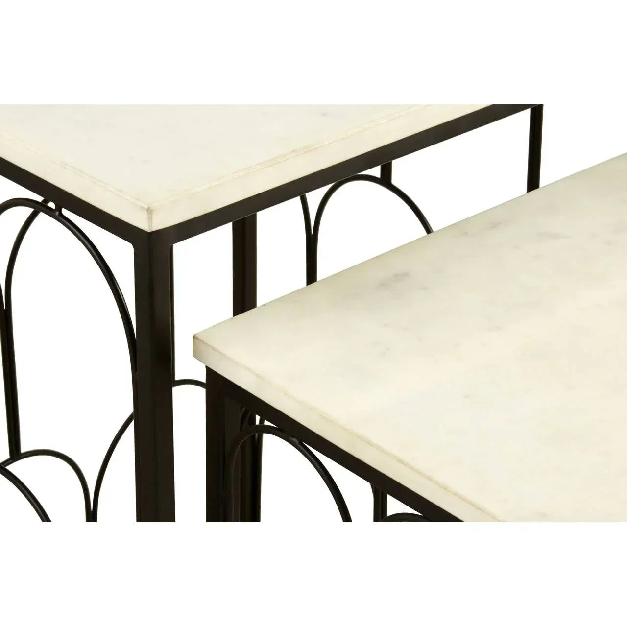 White marble nesting tables with black metal frames and art deco-inspired detailing