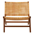 A wooden lounge chair featuring a natural rattan seat and backrest, with a minimalist design and a sturdy frame. The chair has a light brown finish, highlighting the texture of the rattan