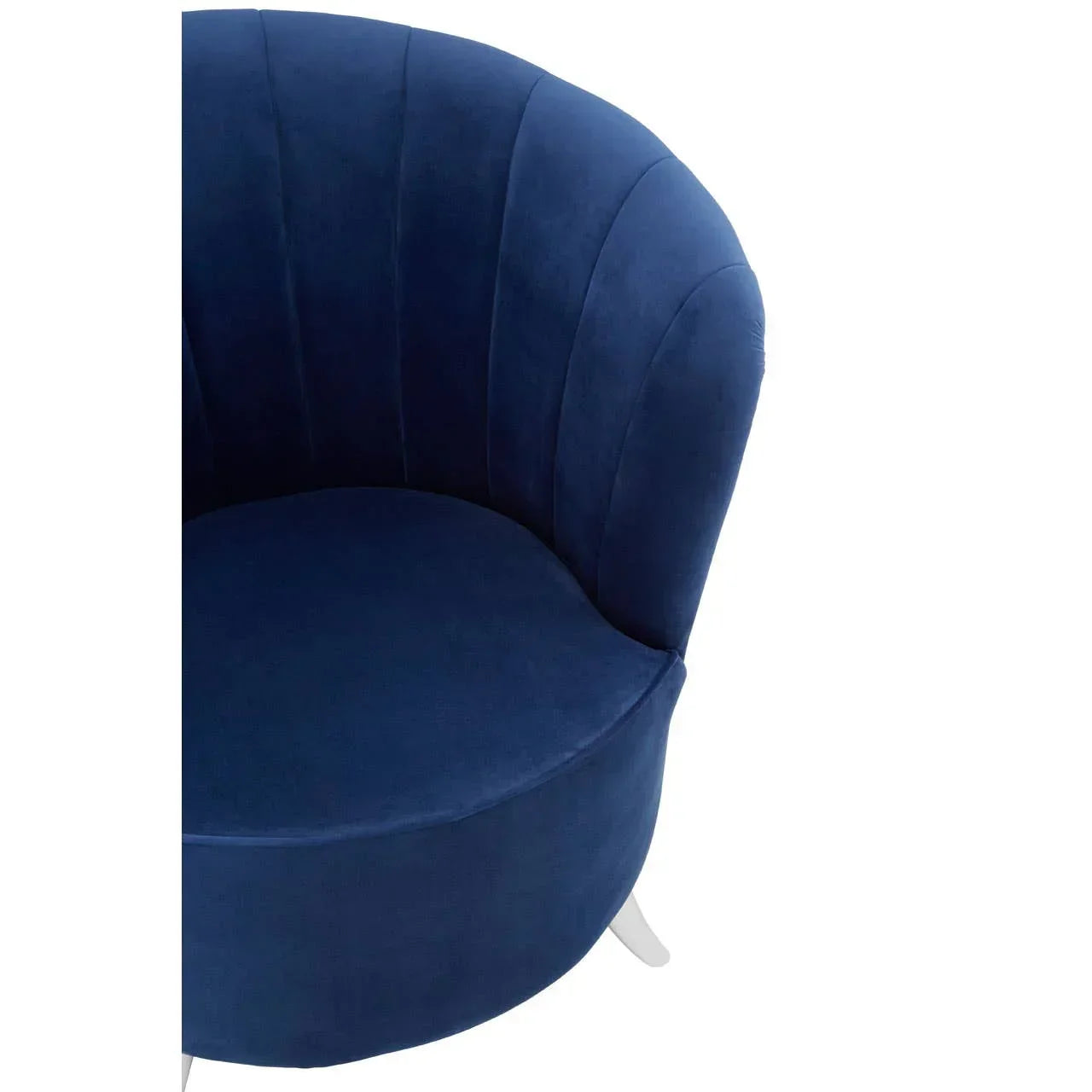 Blue velvet accent chair with curved backrest and vertical stitched detailing, angled view