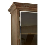 Close-up view of the Richmond White Washed Pine Wood 2 Door Cabinet, showcasing the top edge and one of the glass doors. The cabinet features a light, weathered finish with a natural wood grain texture, highlighting its rustic charm. The glass door is framed in wood, allowing visibility of the interior shelves