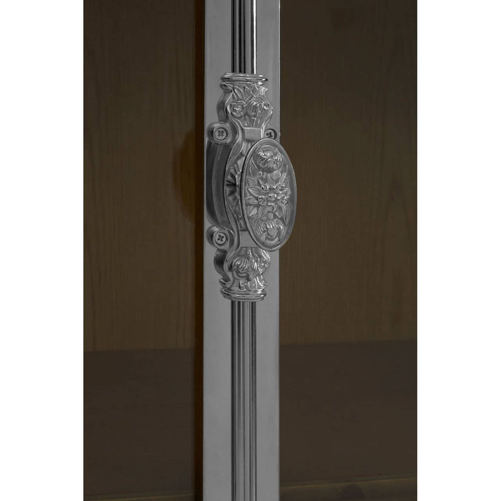 Close-up view of the ornate handle on the Richmond White Washed Pine Wood 2 Door Cabinet, showcasing intricate detailing and a polished finish against a dark interior background