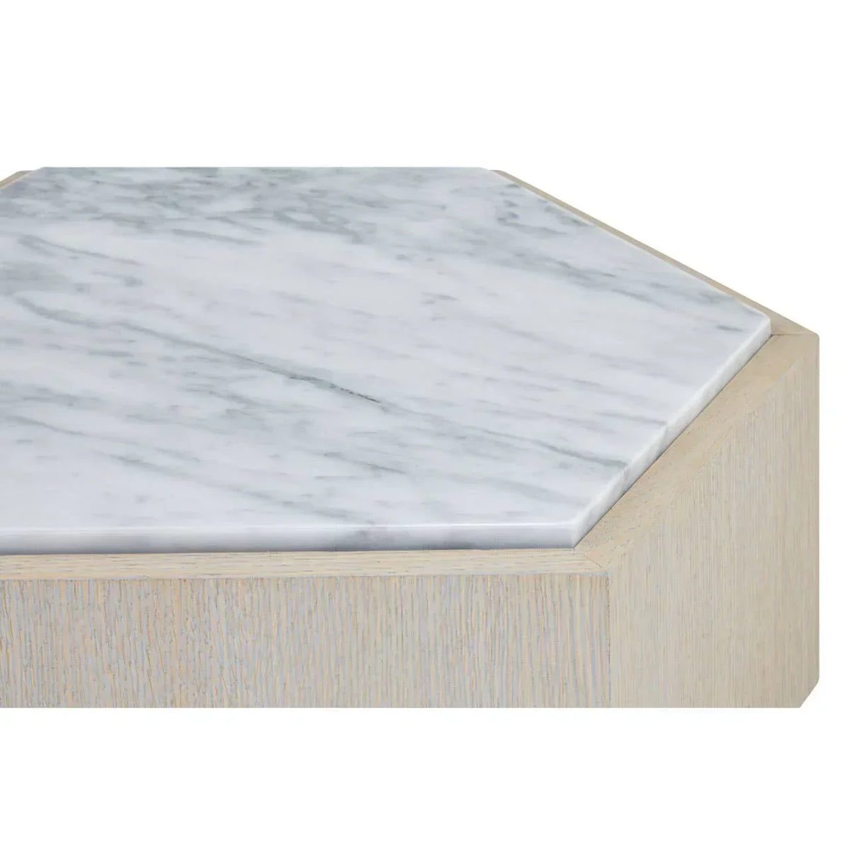 Hexagonal marble coffee table top with light wood base, close-up view
