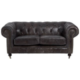 Dark grey brown leather Chesterfield 2 seat sofa featuring a tufted backrest, rolled arms, and wooden legs. The sofa has a classic design with a polished finish, suitable for a stylish living room setting