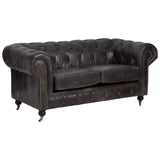 Dark grey-brown leather Chesterfield 2 seat sofa featuring a tufted backrest, rolled arms, and wooden legs with casters. The sofa has a classic design with a polished finish, suitable for a stylish living room setting