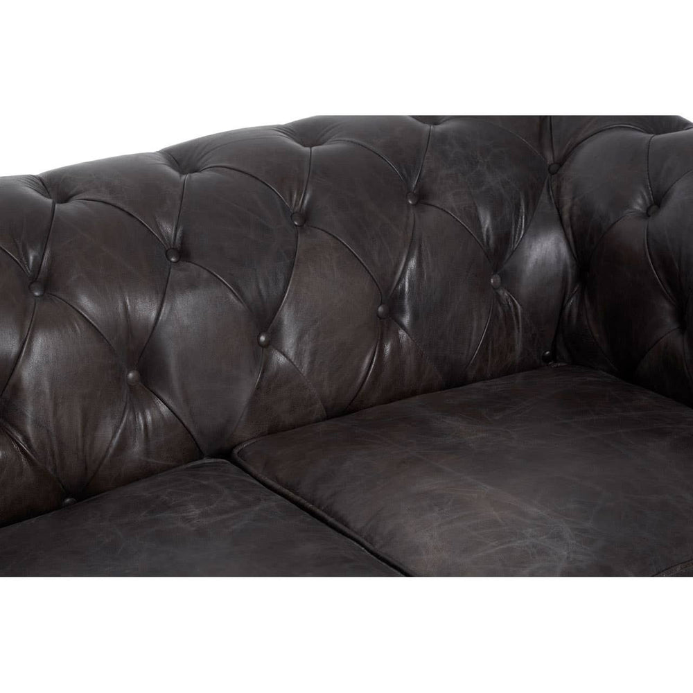 Dark grey brown leather Chesterfield 2 seat sofa featuring a tufted backrest and seat cushions, showcasing a classic design with elegant stitching and a smooth finish