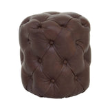 Brown leather stool featuring a button-tufted design with a rounded shape and a soft, textured surface. The stool has a rich, dark brown color and is accented with visible stitching and buttons, providing a classic and elegant look suitable for various home decor styles