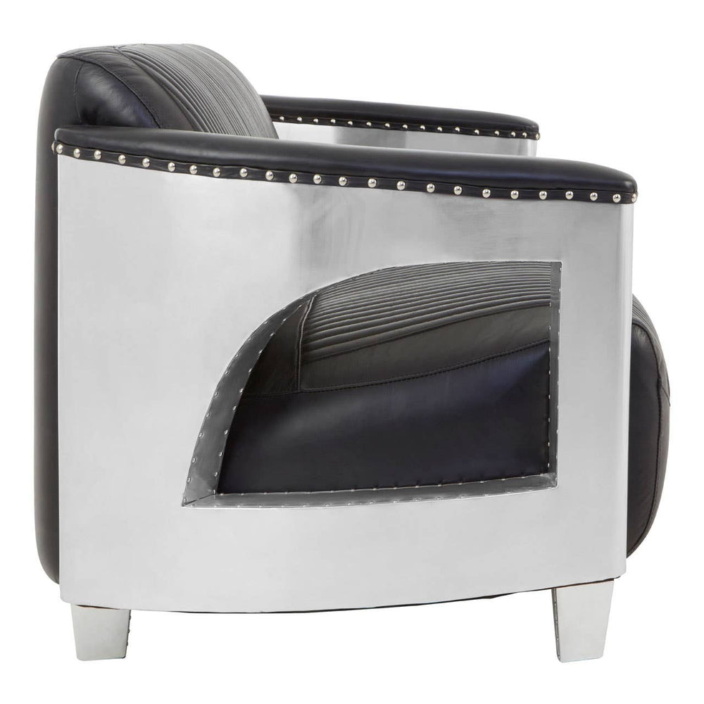 Black leather sofa with three seats, featuring a sleek design and silver legs. The sofa has a smooth finish and is accented with decorative stitching along the edges