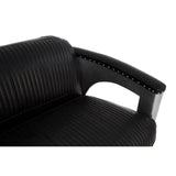 Close-up view of the armrest of a black leather sofa featuring a sleek design with ribbed texture and a cut-out detail for added style