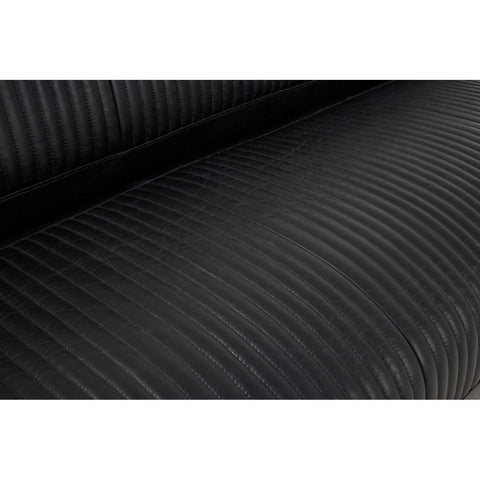 Close-up view of the textured black leather upholstery of the Victor 3 Seat Sofa, highlighting the subtle ribbed pattern and smooth finish