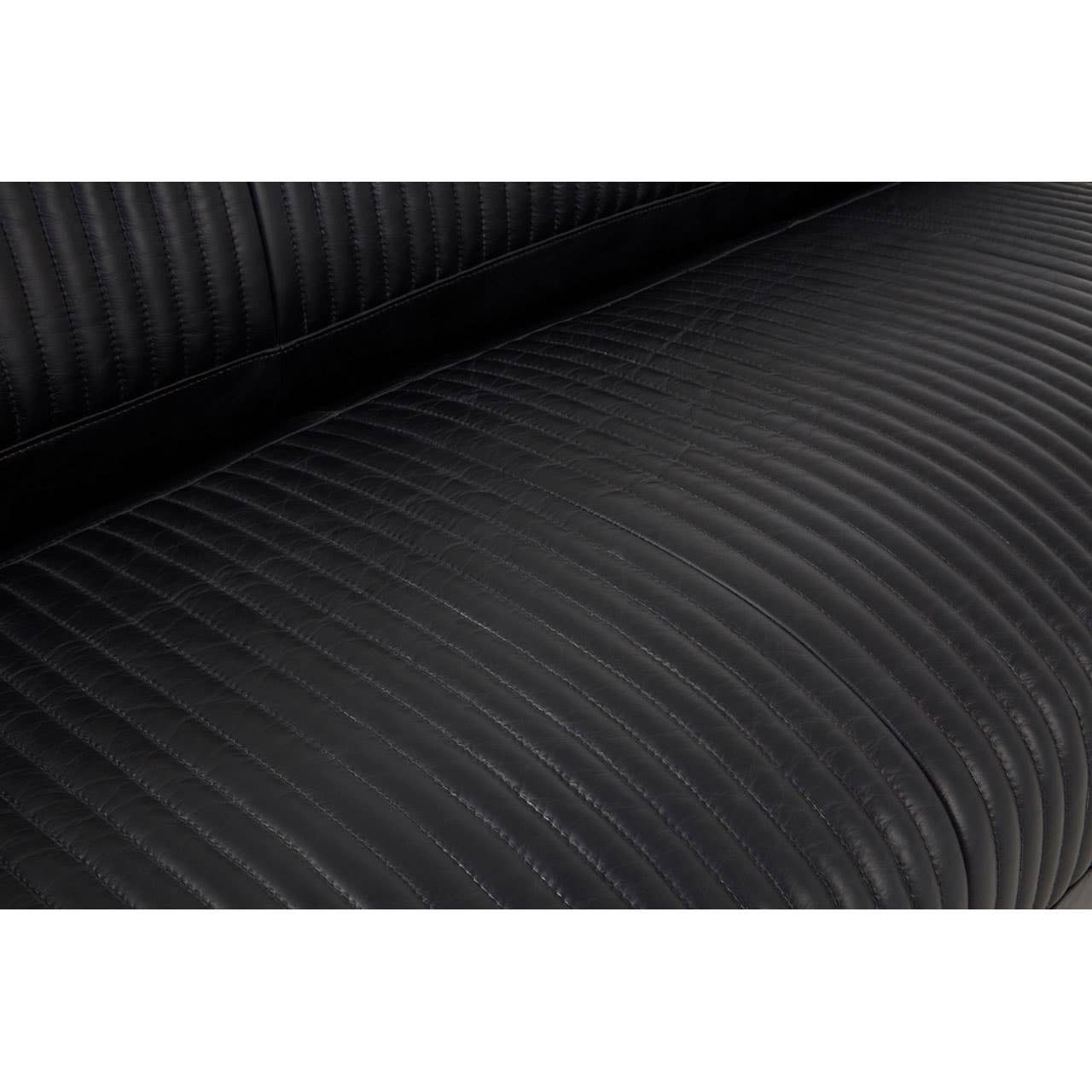 Close-up view of the textured black leather upholstery of the Victor 3 Seat Sofa, highlighting the subtle ribbed pattern and smooth finish