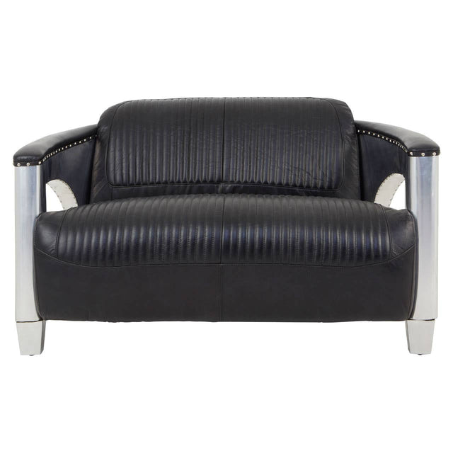 Black leather two-seat sofa with a sleek design, featuring padded backrests and armrests, supported by shiny silver metal legs. The sofa has a modern look with a smooth finish and subtle stitching details