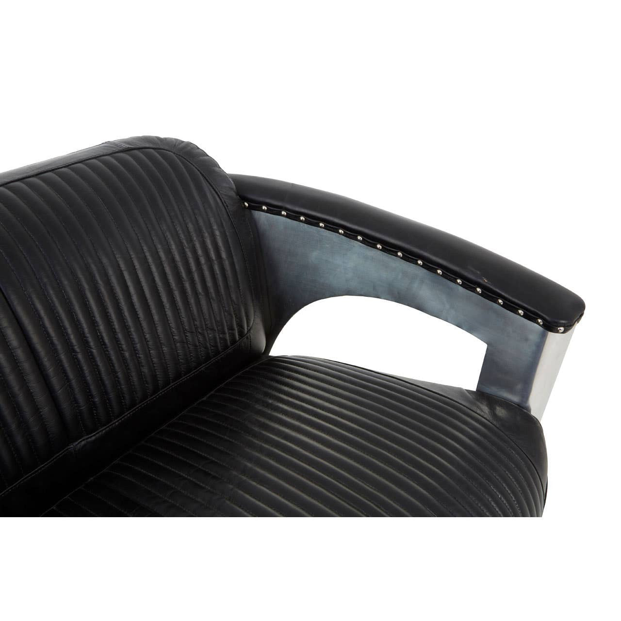 Close-up view of the armrest of a black leather sofa featuring a ribbed texture and a sleek metallic accent. The armrest is designed for comfort and style, showcasing a modern aesthetic
