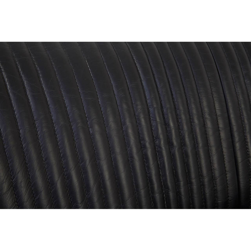 Close-up view of the textured black leather upholstery on the Victor 2 Seat Sofa, showcasing the subtle ribbed pattern and smooth finish