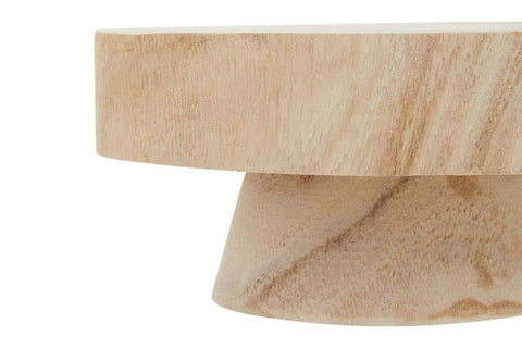 Small wooden riser with a smooth, light-colored surface and a tapered base, showcasing a minimalist design suitable for home decor