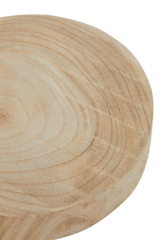 Light-colored wooden riser with a smooth, circular surface showcasing natural wood grain patterns. The edges are slightly rounded, giving it a soft appearance
