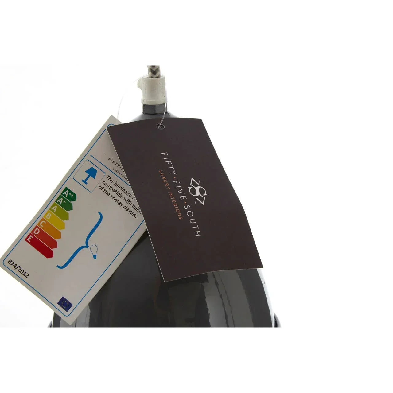 Pendant lamp top with energy label and Fifty Five South product tag attached