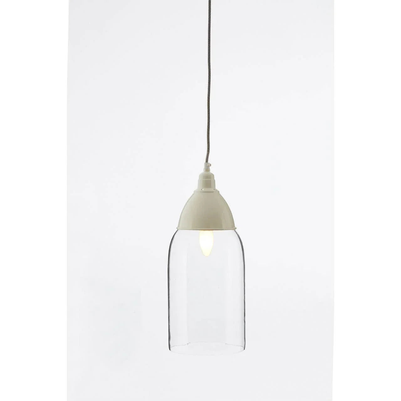 Clear glass pendant light with white metal cap and hanging cord