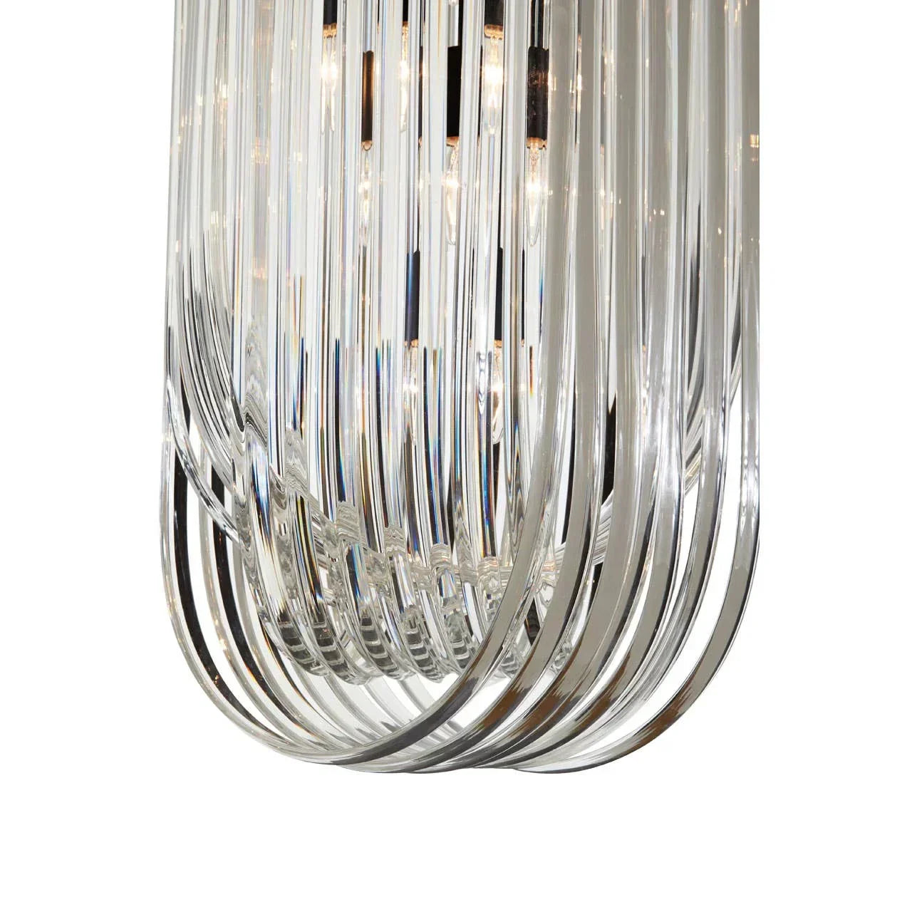 Curved glass chandelier detail with clear vertical rods and multiple interior lights