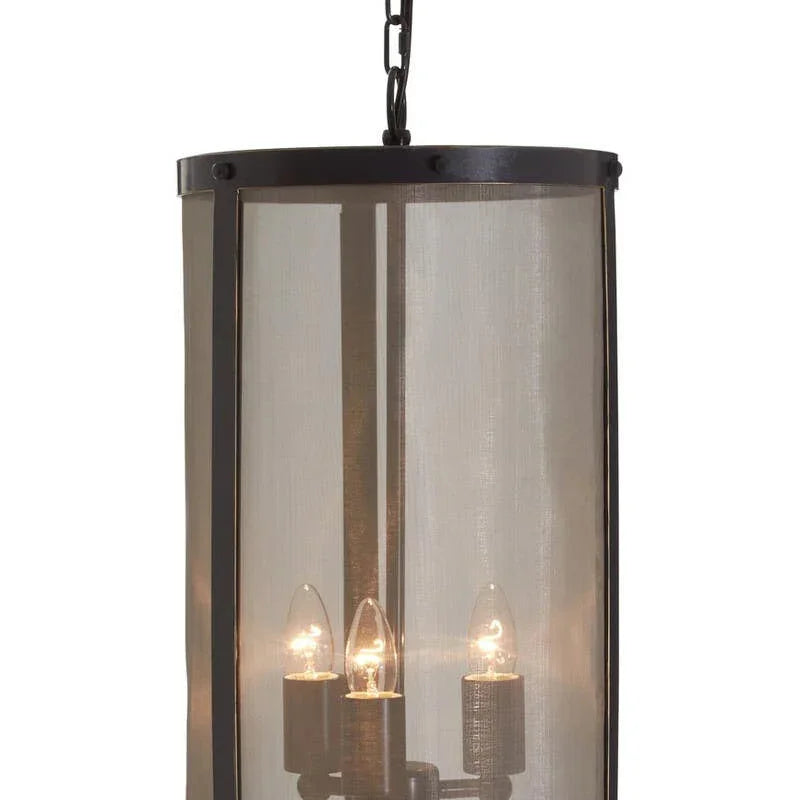 Black metal pendant ceiling light with cylindrical mesh shade and three candle bulbs