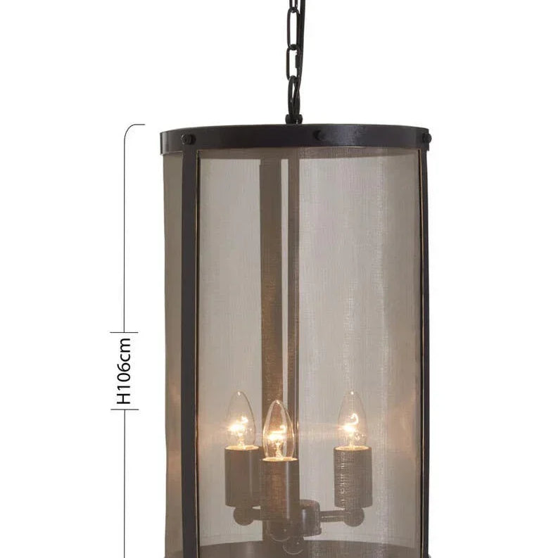 Black metal pendant ceiling light with cylindrical mesh shade and three exposed bulbs