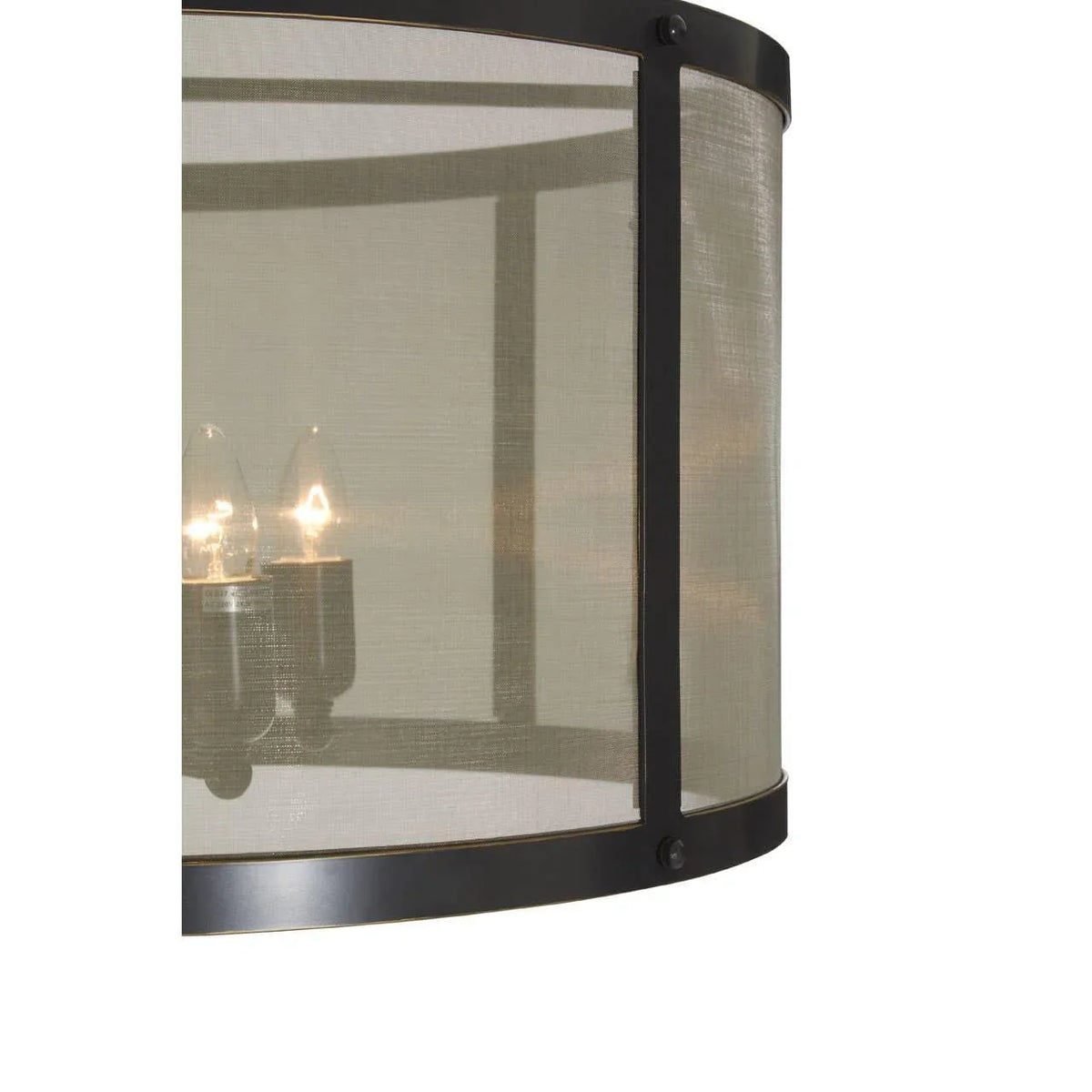 Closeup of black metal and mesh drum ceiling light with exposed bulbs