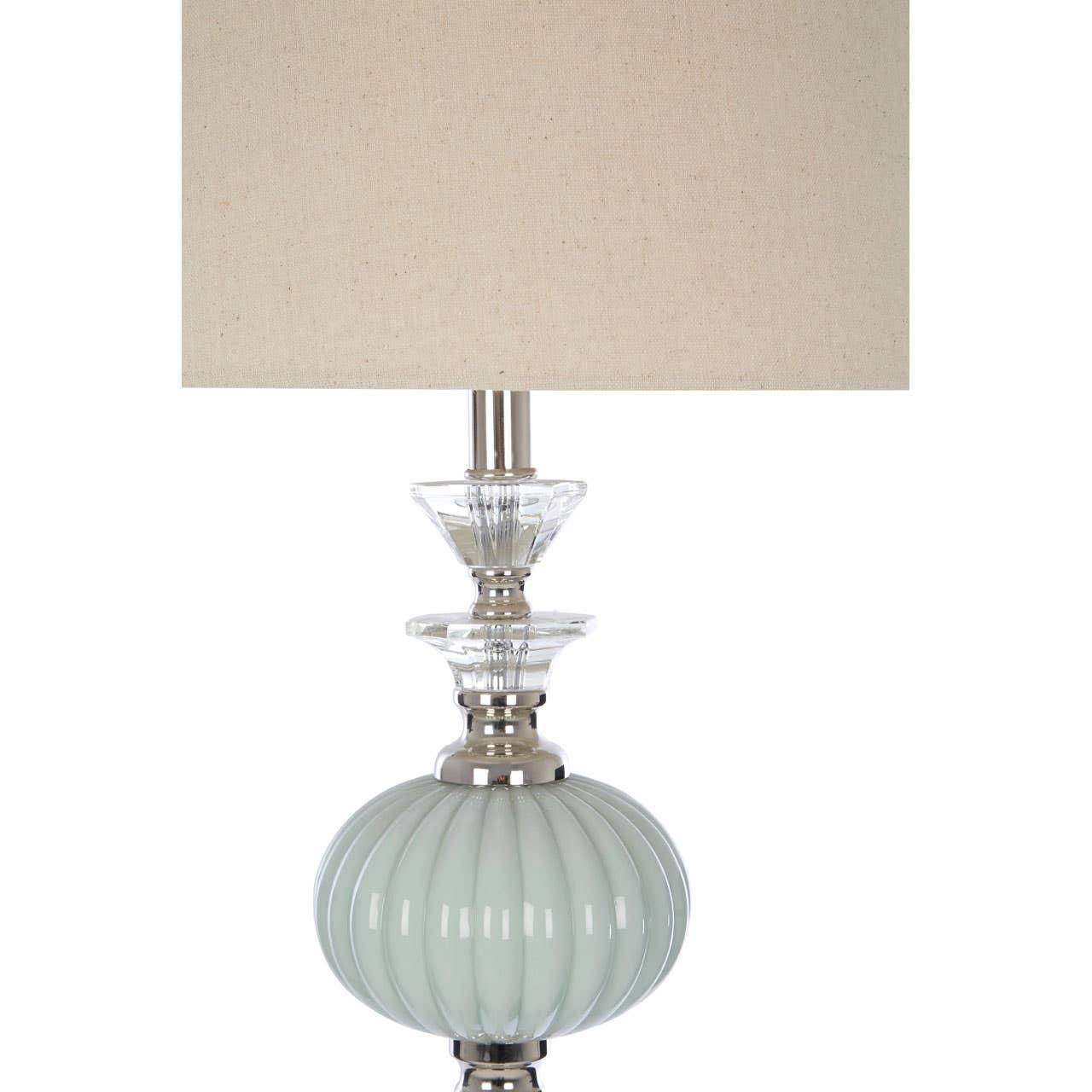 Modern table lamp with ribbed glass base, chrome details, and beige fabric lampshade